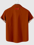 HOO Herren-Kurzarmhemd mit Blattdruck und orangefarbenen Nähten im Stil der 1960er-Jahre